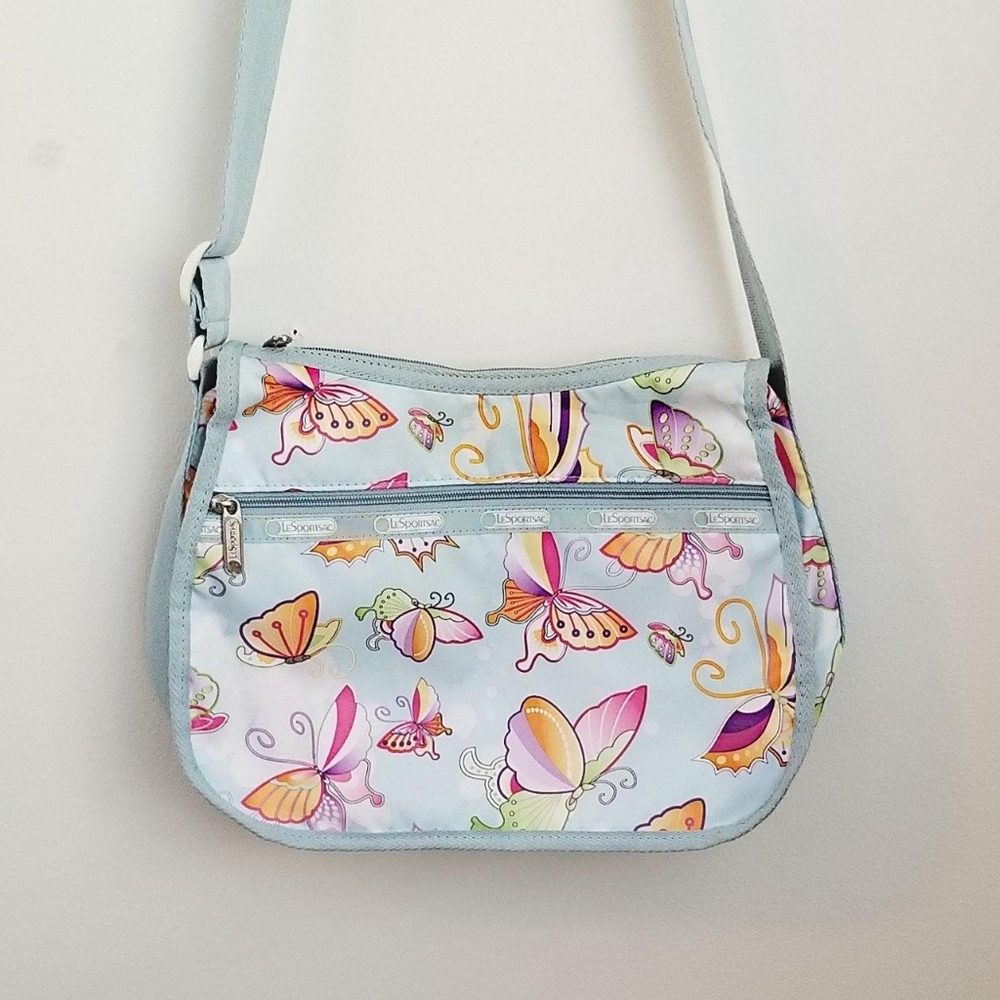 Lesportsac baby blue butterfly crossbody bag.